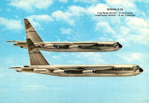 A pair of b-52s fly in formation - left to right