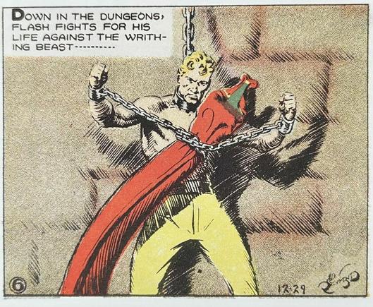 Flash Gordon is chained and wraps his arm chains around the neck of what seems to be a very large phallic red chile. Narration: “Down in the dungeons, Flash fights for his life with the writhing beast….”