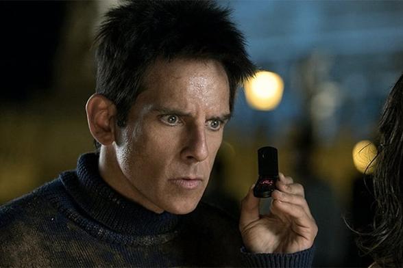 Derek Zoolander with a comically small flip-phone