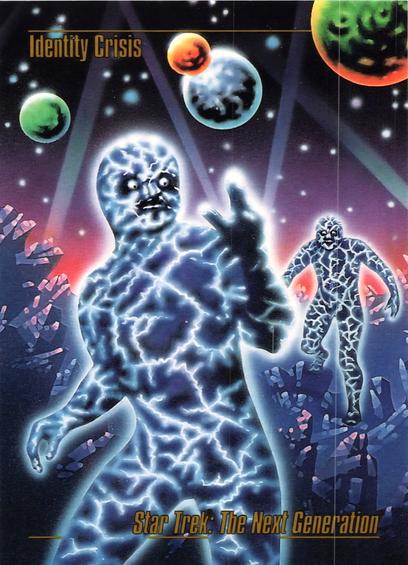 A trading card image of the Star Trek The Next Generation episode Identity Crisis, featuring a dark but glowing humanoid form, with blue energy lines criscrossing his body. In the background are large crystals and several planets colored red, green, and blue, in the sky.