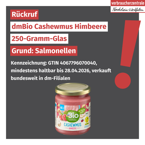 Logo der Verbraucherzentrale Nordrhein-Westfalen, Text: "Rückruf dmBio Cashewmus Himbeere, 250-Gramm-Glas, Grund: Salmonellen. Kennzeichnung: GTIN 4067796070040, mindestens haltbar bis 28.04.2026, verkauft bundesweit in dm-Filialen" sowie Produktabbilung.