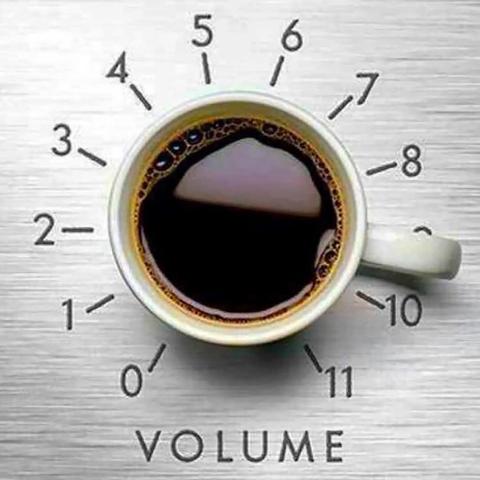 cup of coffee seen from above, looking like a dial
underneath the label: volume, plus numbers going from 0 to 11