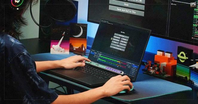 Person, desk, laptop, finger about to touch the Flexbar