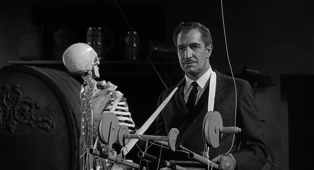 This is a picture of Vincent Price with a skeleton. It's tied to a rope that he can control and move around the room.