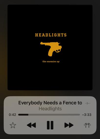 The album art for “The Enemies EP” by Headlights depicting the outline of a unique handgun in profile, the barrel pointing backwards. When held, the barrel of the gun would point at the holder.