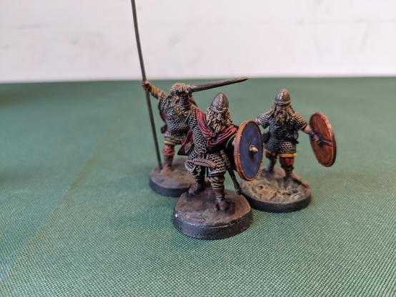 Three miniature vikings.