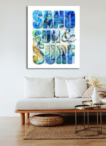 Artwork in blue and aqua with a hint of yellow spelling Sand Sun & Surf by artist Sharon Cummings.  In a furniture setting.  Haiku in post.