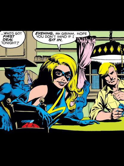 Inside a kitchen, the Beast sips soda pop sitting between Ms. Marvel and Pym at a table. Someone asks off panel, “…who’s got FIRST DEAL tonight?“ Ms. Marvel says, “EVENING, Mr. Grimm. Hope you don’t mind if I SET IN.“