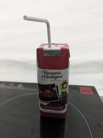 25cl carton of French wine with a daft little straw poked in the top, just like the cartons of juice you'd get to go on school trips with