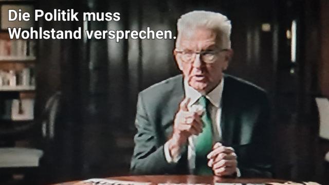 Kretschmann, erhobener Zeigefinger, zitat:
Politik muss Wohlstand versprechen.