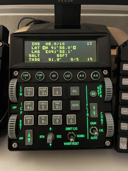 Winwing ICP with flight data imported from DCS being displayed on the DED. The button labels are illuminated in green.