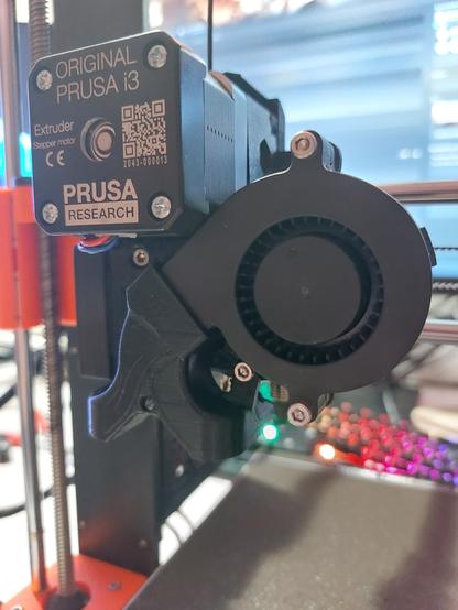 Same tool head from the front-right, focused on the filament cooling fan.