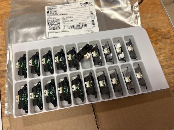 20 infrared distance sensors in a plastic tray. The tray appears to be a corner cut from a larger tray.