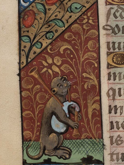 medieval marginalia: miniature painting depicting a brown otter sitting upright playing the bagpipes, on green ground against red background with gold floral ornamental decoration, with cut off text visible to right and additional floral decoration visible above