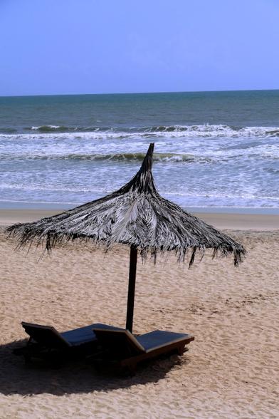 An umbrella at the sand beach