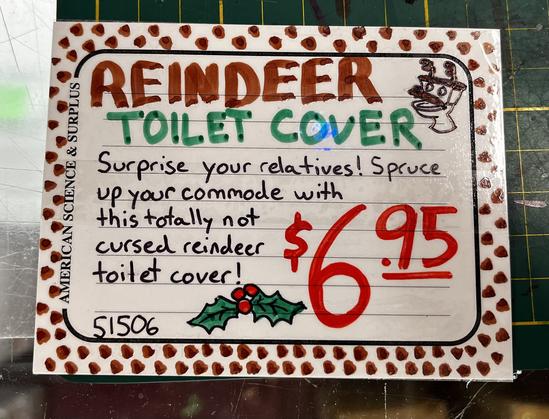 Custom drawn sign for a reindeer toilet seat cover