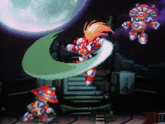 Zero's beam saber cracks the darkness in his battle against Split Mushroom.