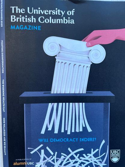 The cover of a paper magazine showing an iconic column being put through a scanner.