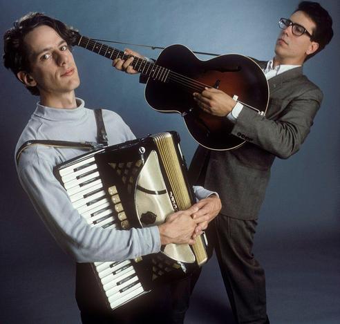 They Might Be Giants, posing with accordion and guitar