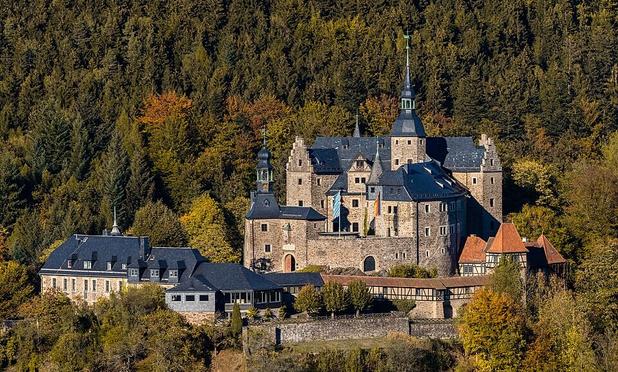 Lauenstein Castle in Upper Franconia is a medieval hilltop castle where English pounds were counterfeited by prisoners during the Second World War to destabilize the currency of the war opponents. From March to June 1944, Admiral Wilhelm Canaris was under house arrest in the castle.
