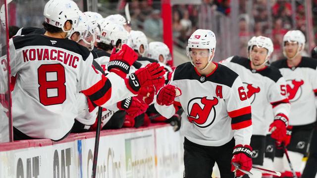 New Jersey Devils left wing Jesper Bratt (63) celebrates his goal against the Carolina Hurricanes. Mandatory Credit: James Guillory-Imagn Images