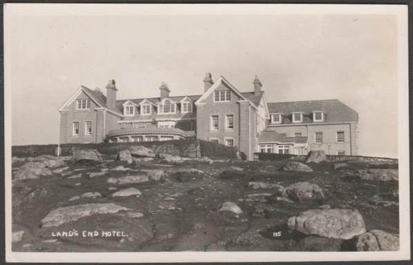 Monochrome real photographic postcard showing a view of the Land's End Hotel at Sennen in Cornwall.

Published by The First and Last House in England, Land's End, No 115, with Land's End cachet type 63, c.1950.

Postally unused.

Very good condition, with very slight corner bumps.