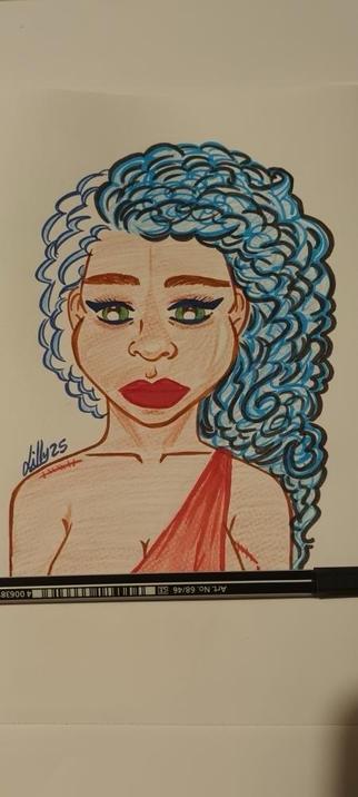 Original colorful illustration by Lilly Skyline of a woman with curly blue hair and green eyes. She has a bold red lip and is wearing a one-shoulder top featuring a red accent. A black pen is placed next to the drawing for reference.