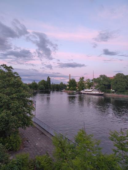 The view into the Spreekanal from the Danmbrücke on a sunset after the rain