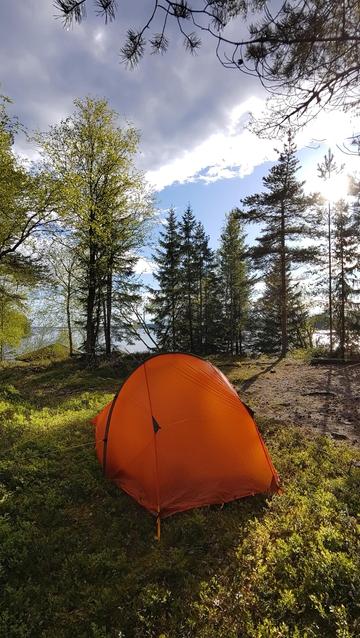 A pithed rent on an Island with trees