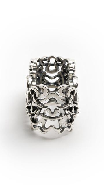 Xover0's solid sterling silver Ancient Courses Napkin Ring is photographed in a symmetrical position showing the river paths mirrored on the reverse side for optimal legibility and design clarity once the napkin is removed.