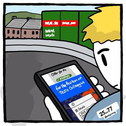 Pictured looking at my phone that has a website confirmation of my job that I had been waiting for, for weeks! In the background of local town is a delivery lorry, row of houses and distant hills, under a sunny blue sky