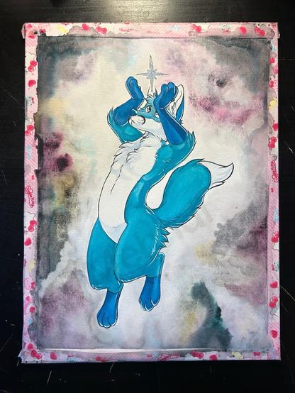 A blue fox with darker blue legs and arms holding a glittering star over his head. His arms are above his head with his hands on either side of the star. The background is various shades of granulation color very reminiscent of nebulas in space.