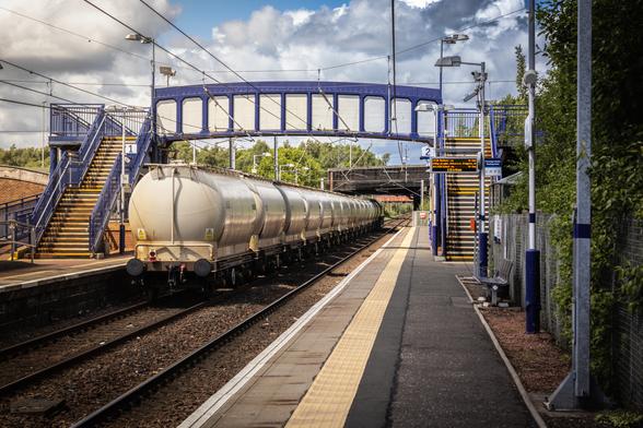 A rake of PCA wagons heading through Whifflet station