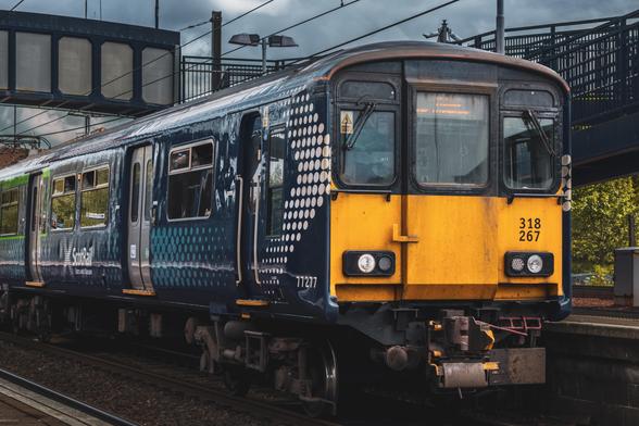 ScotRail Class 318, 318267 stopped in Platform 1 at Whifflet station