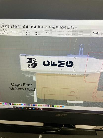 Picture of a computer screen showing the Lightburn program with a camera view of the bench brush in the laser bed.