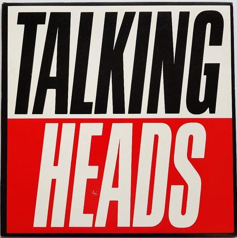 The cover of the Talking Heads album "True Stories" which simply has the band's name with "Talking" in black on the top half against a white background and "Heads" on the lower half in white on a red background.