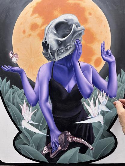 Oil painting in progress of a woman with a lynx skull for a head, with 4 arms. One hand is holding a hose from a gas pump, one hand is on her cheek, one holds up 2 fingers, one is palm up with a zippo lighter floating just above. She is surrounded by plants and bird of paradise flowers.