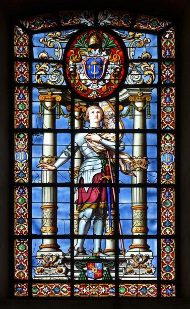 This stained glass window (1880) located in the Cathédrale Saint-Louis (La Rochelle, France) depicts Joan of Arc. Today is St. Joan's feast day.