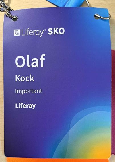 An event name tag, featuring the job title "Important"