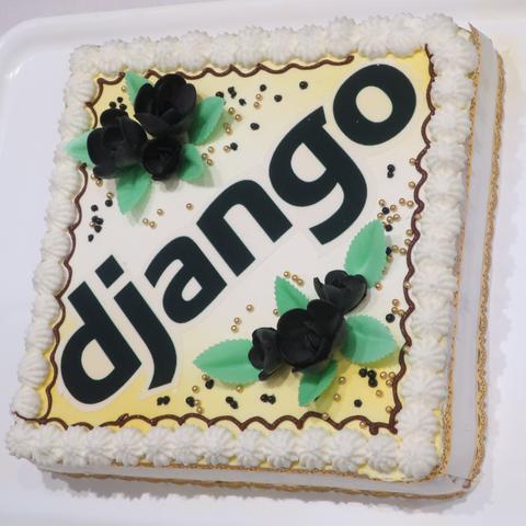 An image of a cake with the Django logo