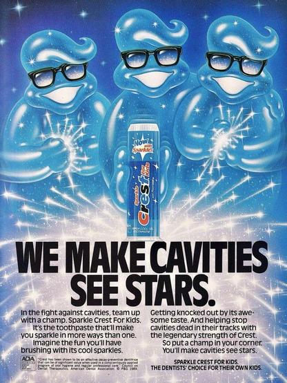 Three light blue toothpaste people post with a can of toothpaste.