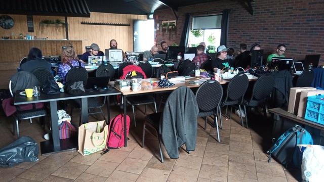 People using their computers at a demoparty