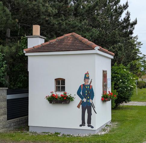 The pre-WW1 custom's officers shelter, at one of the few border crossings between Austria and Hungary between 1031 and 1921. This one is located near the river Leitha, near Wiener Neustadt, Austria. After WW1, the border was moved approx 40km to the east in this area to suit most of the local population at the time who were German speaking. May 2025.