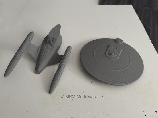 Secondary hull and saucer sections in grey plastic.
