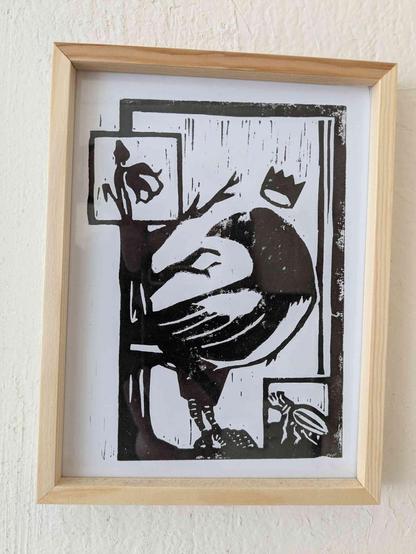 A monochrome linocut print featuring a crowned magpie, a flower, and a beetle.