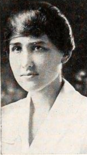 Elizabeth Kellam, from the 1919 yearbook of Vassar College; a young white woman with dark hair and eyes, wearing a white blouse