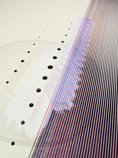 Close up of abstract pen plotted print made from overlapping red and blue pen lines