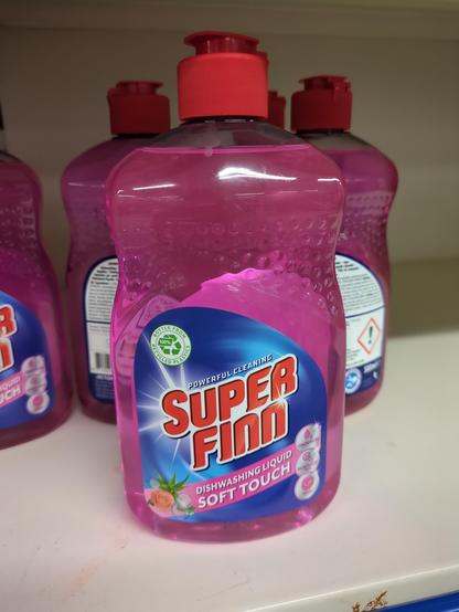 A bottle of pink dish soap in a white supermarket shelf. One bottle is in the front, about three and a half a visible in the back. 

The name or brand is "Super Finn" which is funny because my name is Finn.