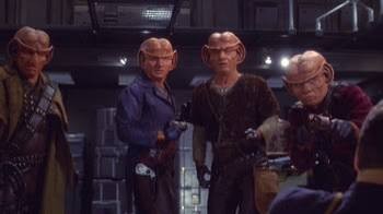 Four Ferengi taking over the Enterprise ship