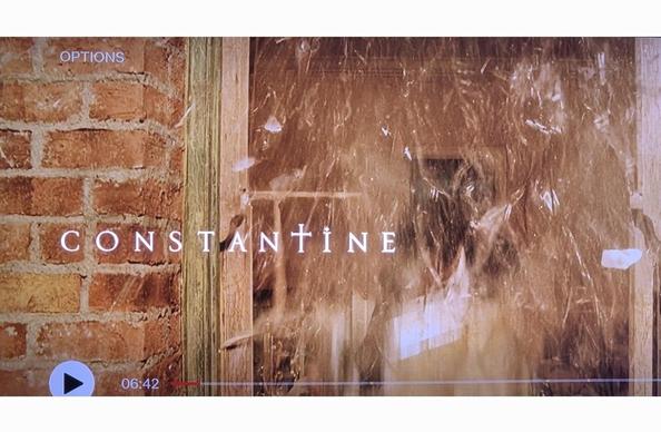CONSTANTINE (the T in the logo is a cross)
John has just smashed the window in the brownstone into tiny pieces.